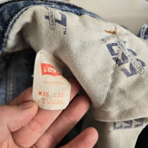 Vintage Levi's 557 Cowboy Distressed Jeans